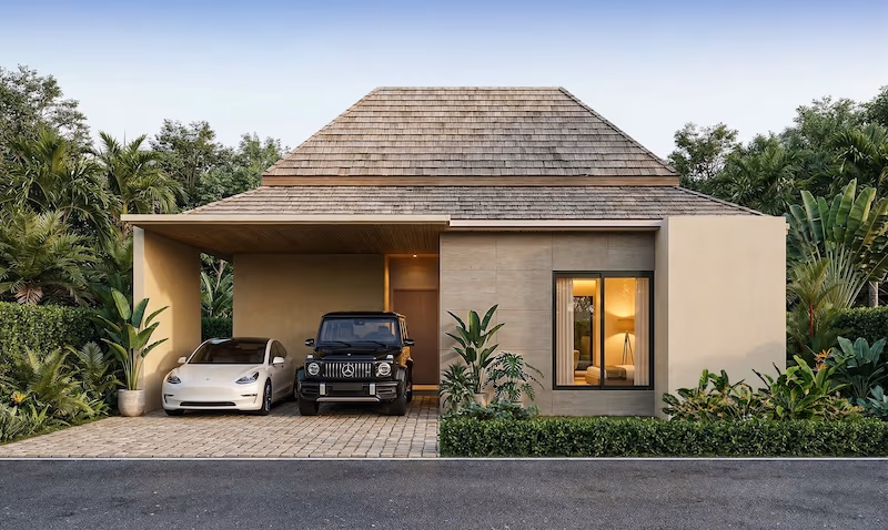 Modern single-story house with a wooden shingle roof; driveway under a carport holds a white sedan and a black SUV, surrounded by tropical plants.